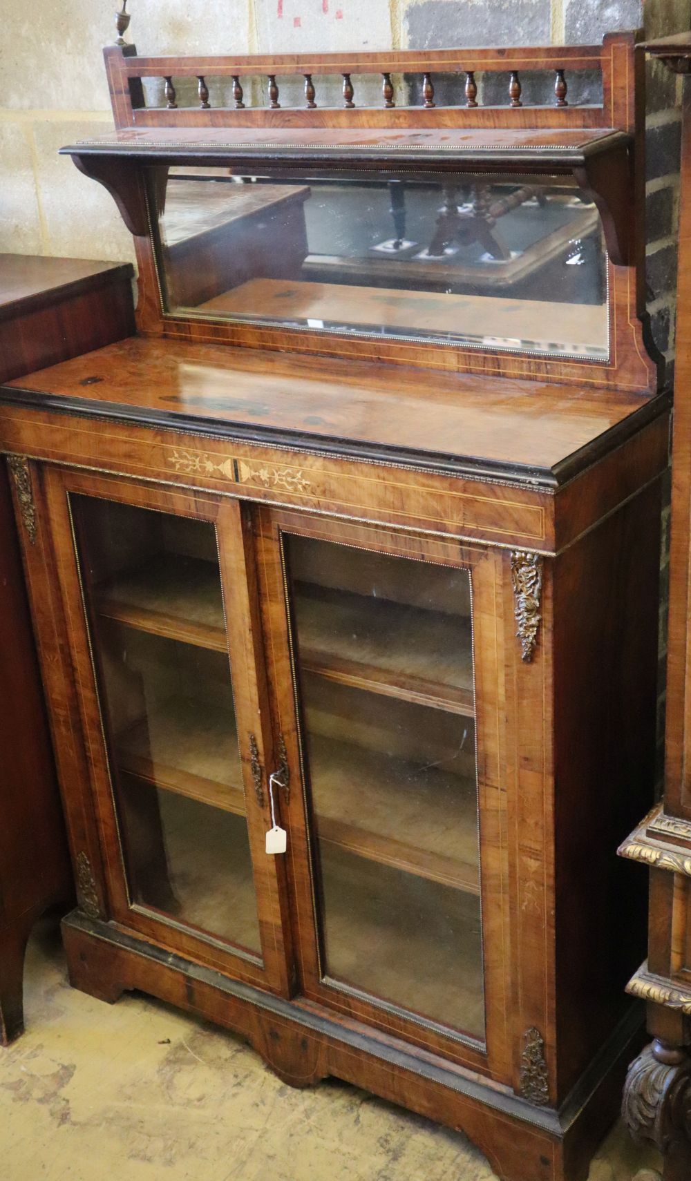 A late Victorian walnut mirror back pier cabinet, W.90cm, D.34cm, H.148cm